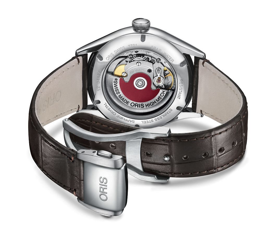 Het gecertificeerde chronometeruurwerk Oris Calibre 737 is zichtbaar door de kastbodem.