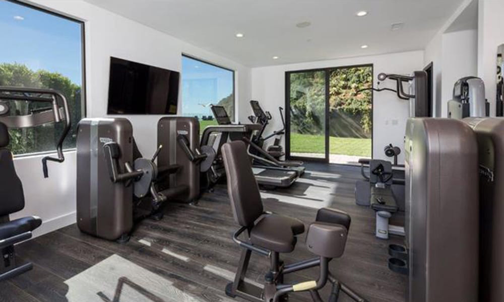 John-Legend-And-Chrissy-Teigen-Beverly-Hills-Real-Estate-Gym 16-21-39-179